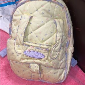 baby doll backpack filled with toys